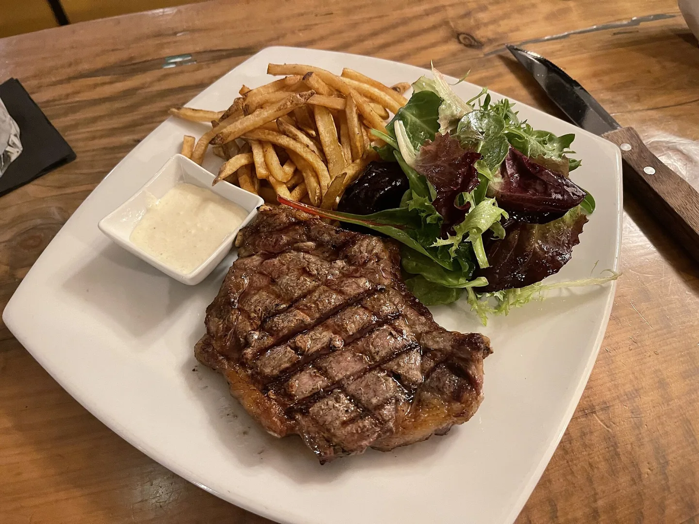 Ribeye steak frites with side salad at Rock Sea's, Hopland, California