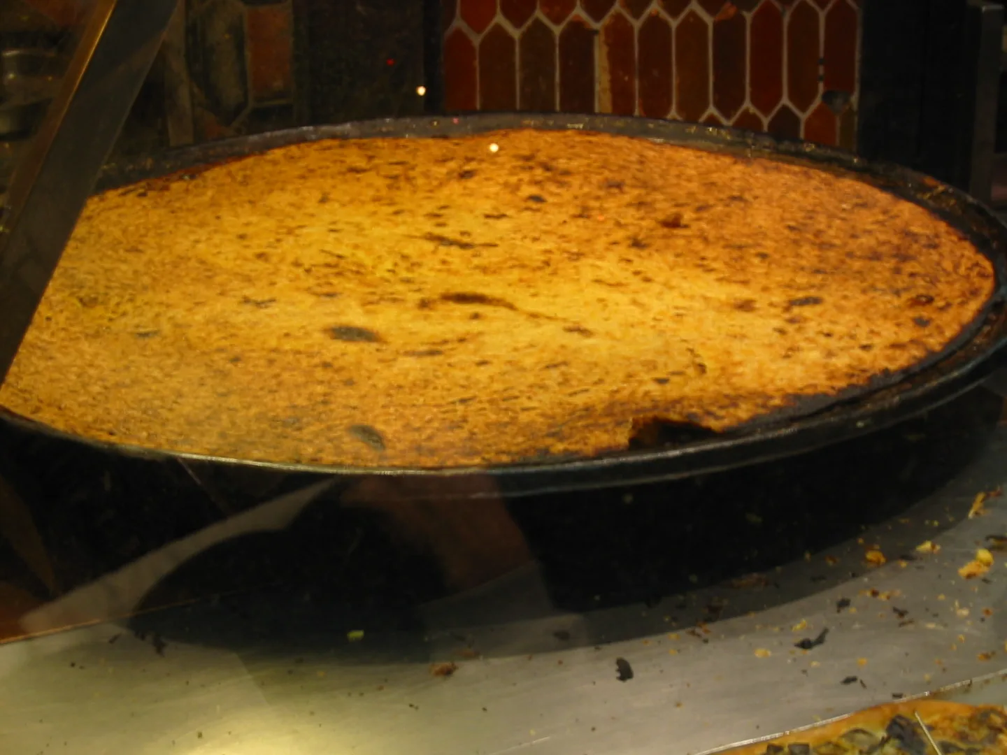 A large pan of socca fresh from the oven in Nice.