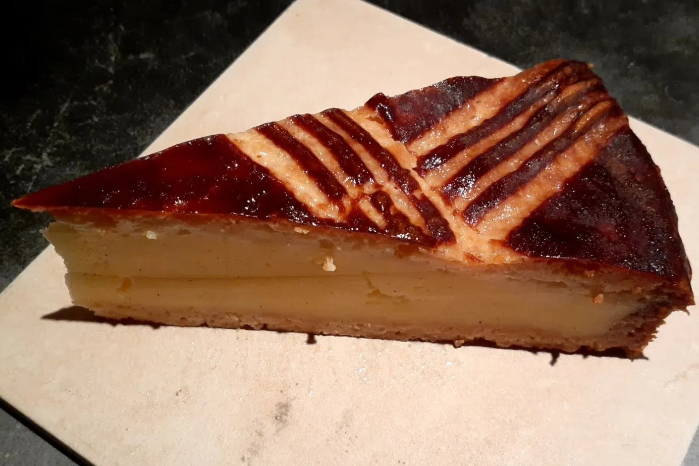 A slice of cream-filled gâteau basque.