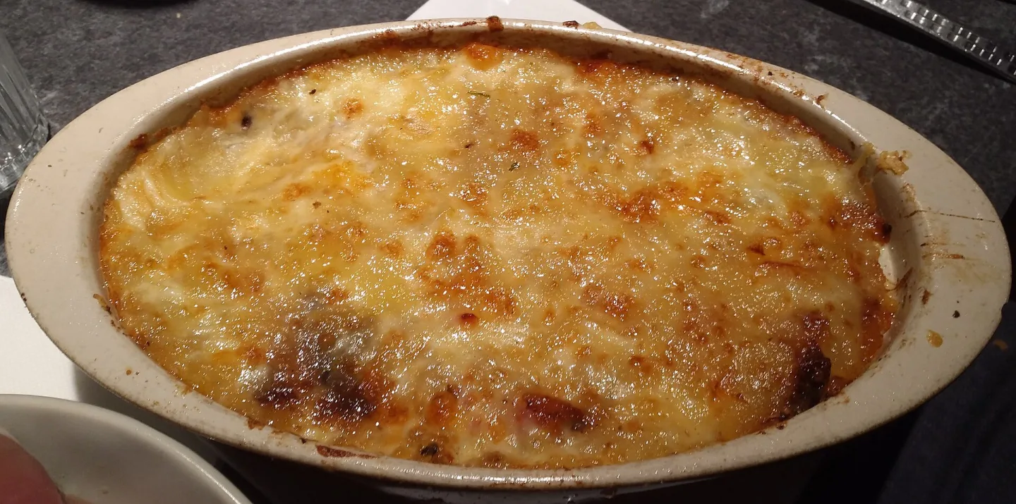 A gratinéed restaurant interpretation of truffade.